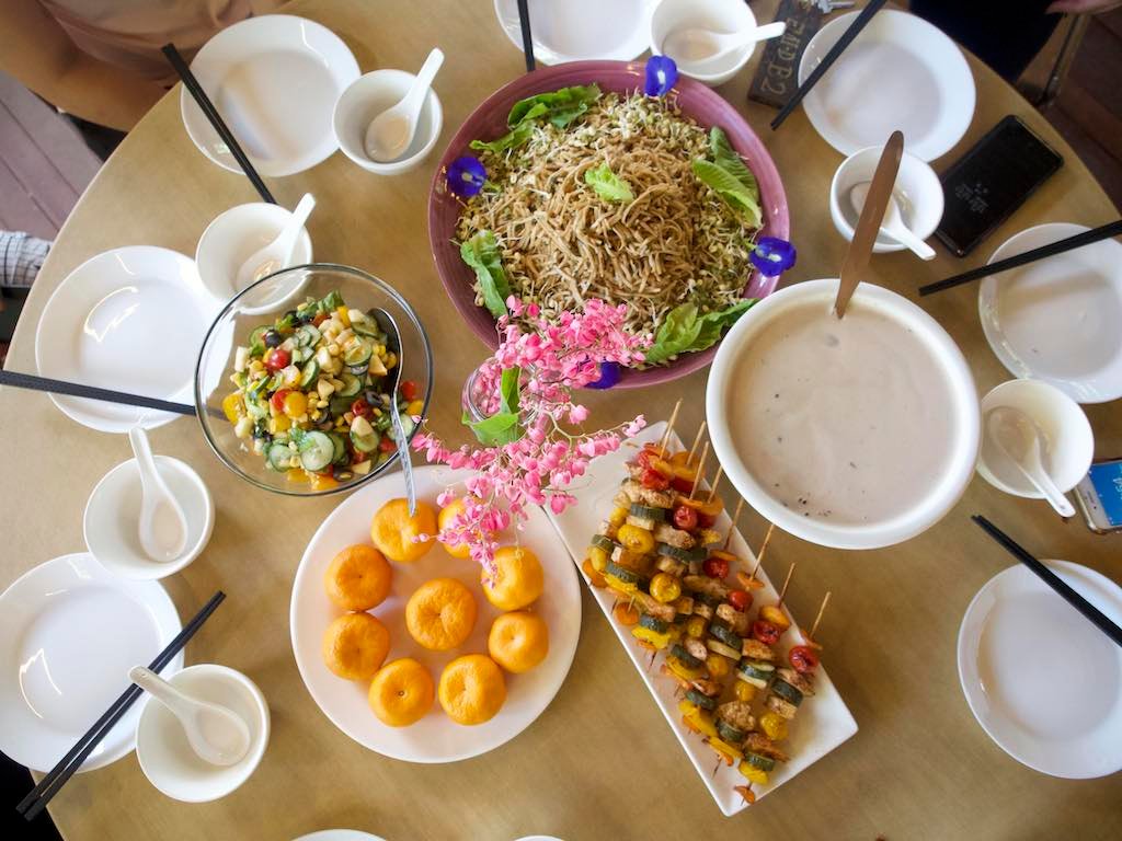 full meal with main dish, dessert and fruits